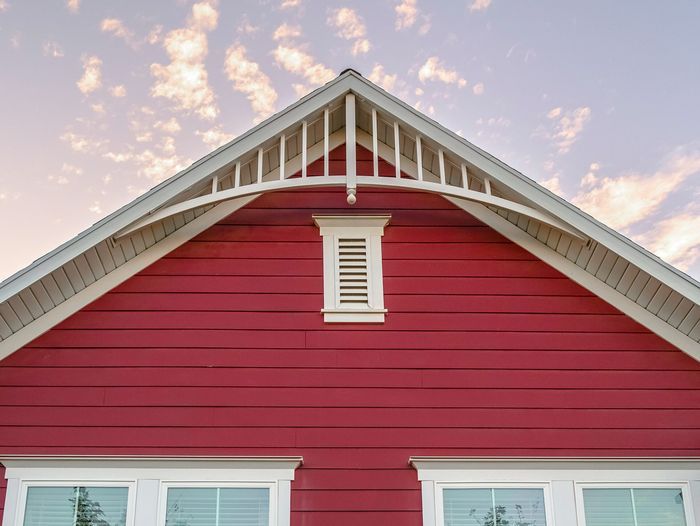 Gable vent on a red house