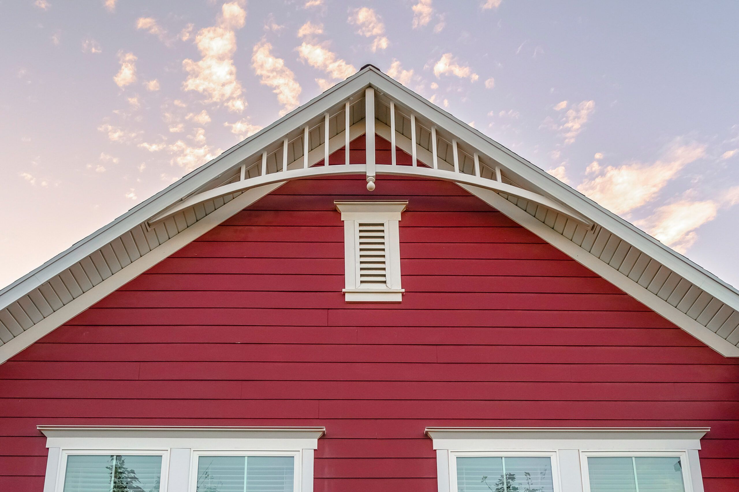 Gable vent on a red house