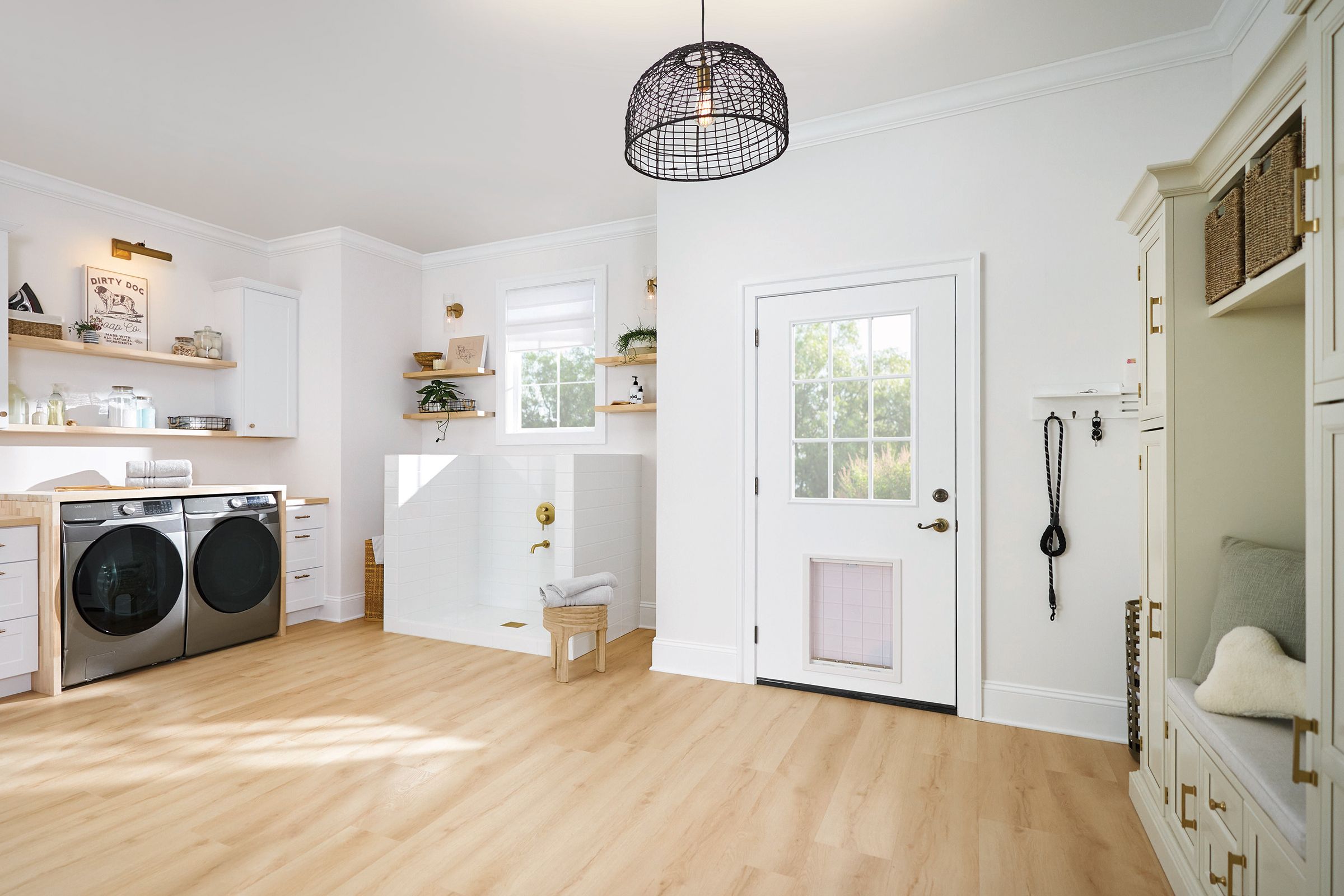 Laundry room with luxury vinyl flooring