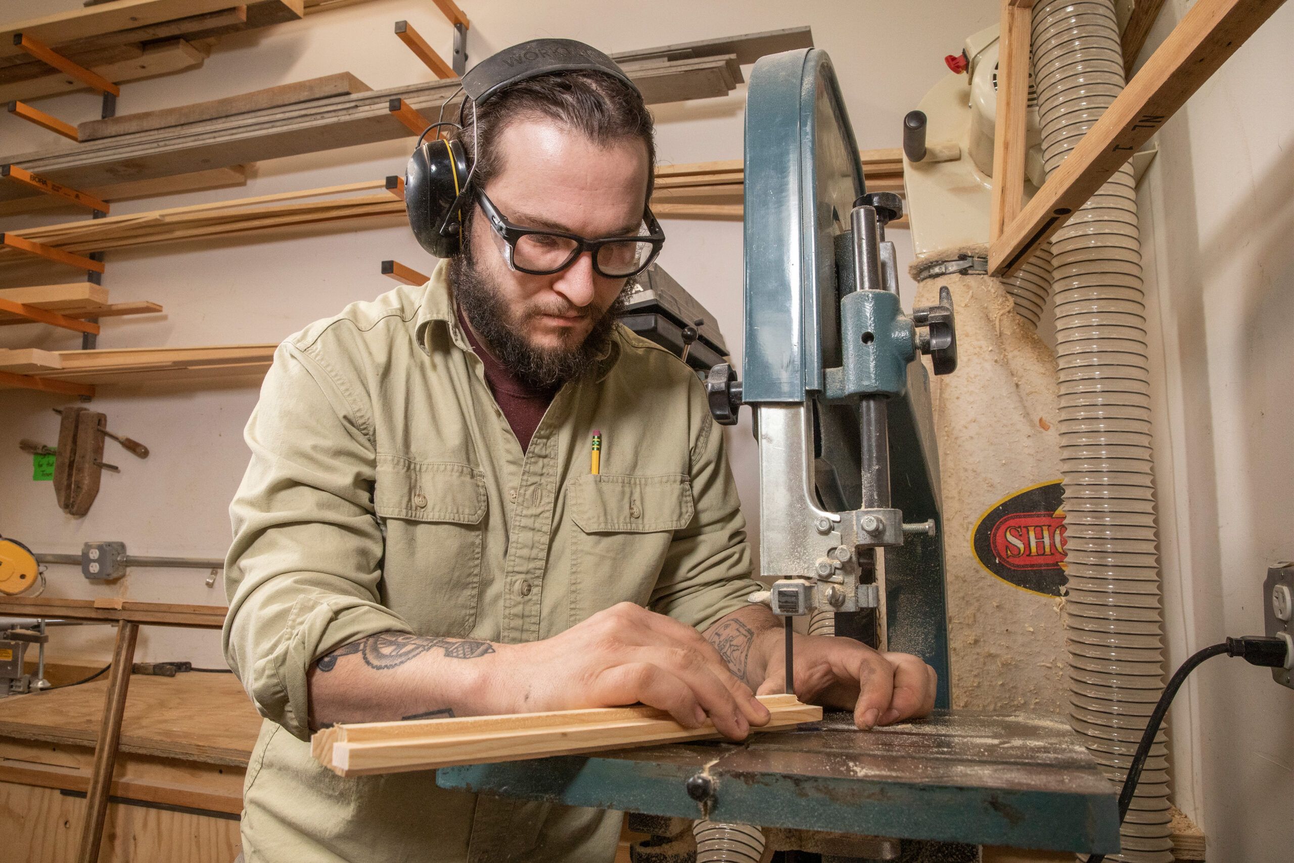 Man using a band saw