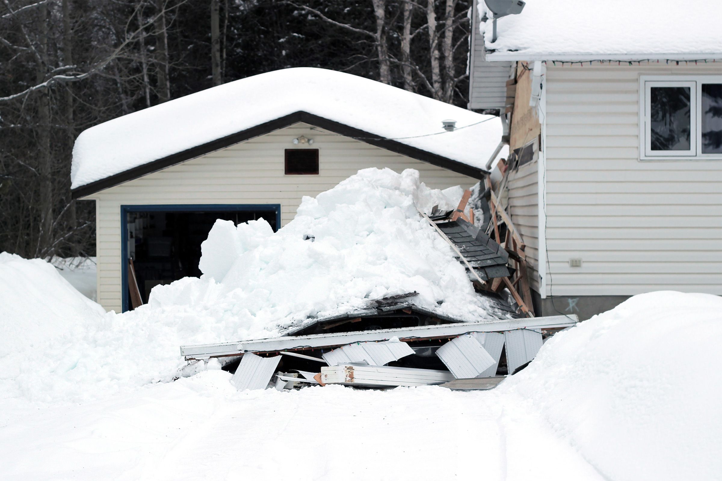 collapsed roof after a snow storm