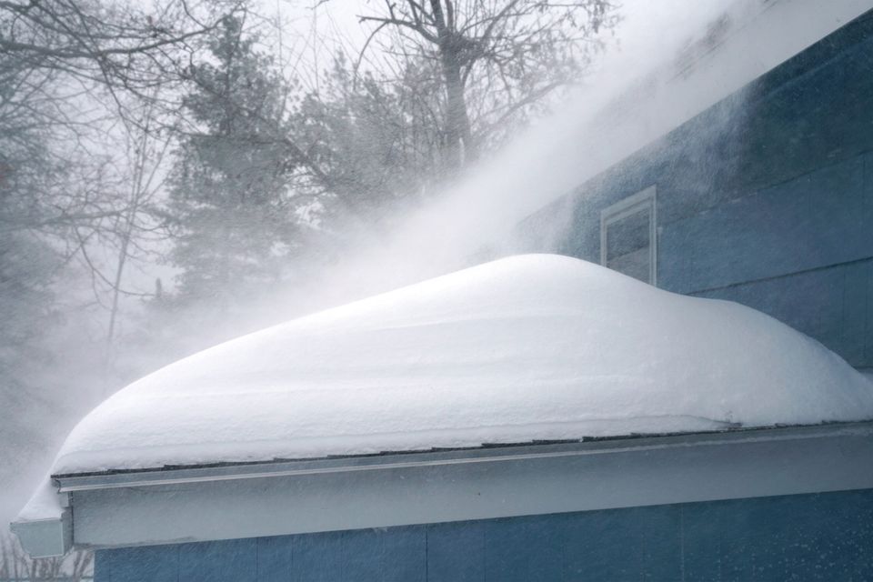 Drifts of snow on a roof top